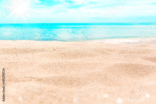 Tropical island beach nature blurred bokeh background, yellow sand, blue sea water, turquoise ocean, sunny sky white clouds, summer holidays template, vacation concept, travel banner, empty copy space