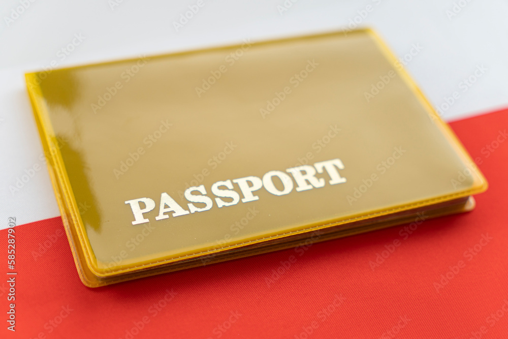 National passport and flag of Poland. Immigration, refugee, change of citizenship, political refuge, residence, European Union concept. Travel, recieving visa and tourism National passport and flag of Poland. Immigration, refugee, change of citizenship, political refuge, residence, European Union concept. Travel, recieving visa and tourism