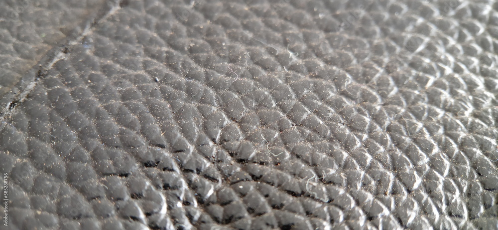 the texture of black leather vest the texture of black leather vest