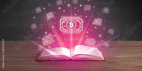 Open book with currency icons above