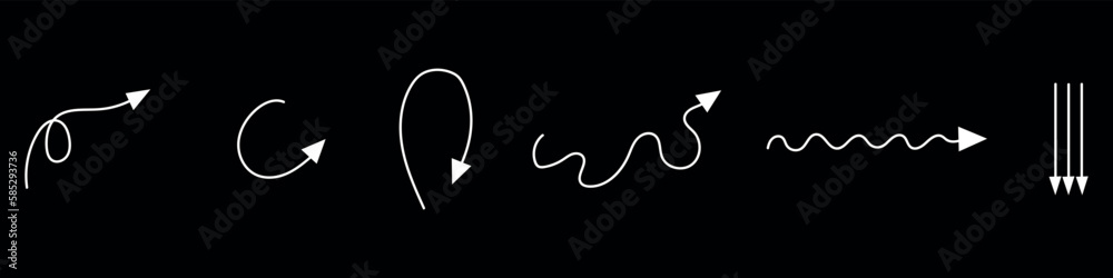 Group of different arrows on dark background Group of different arrows on dark background