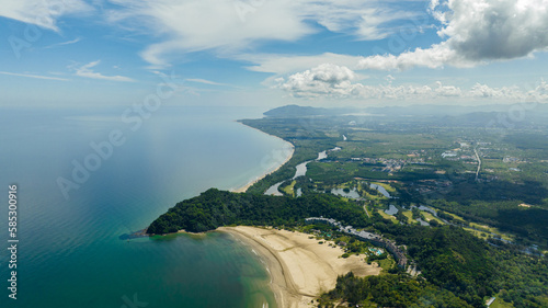Tropical sandy beach and blue sea view from above. Borneo, Malaysia.