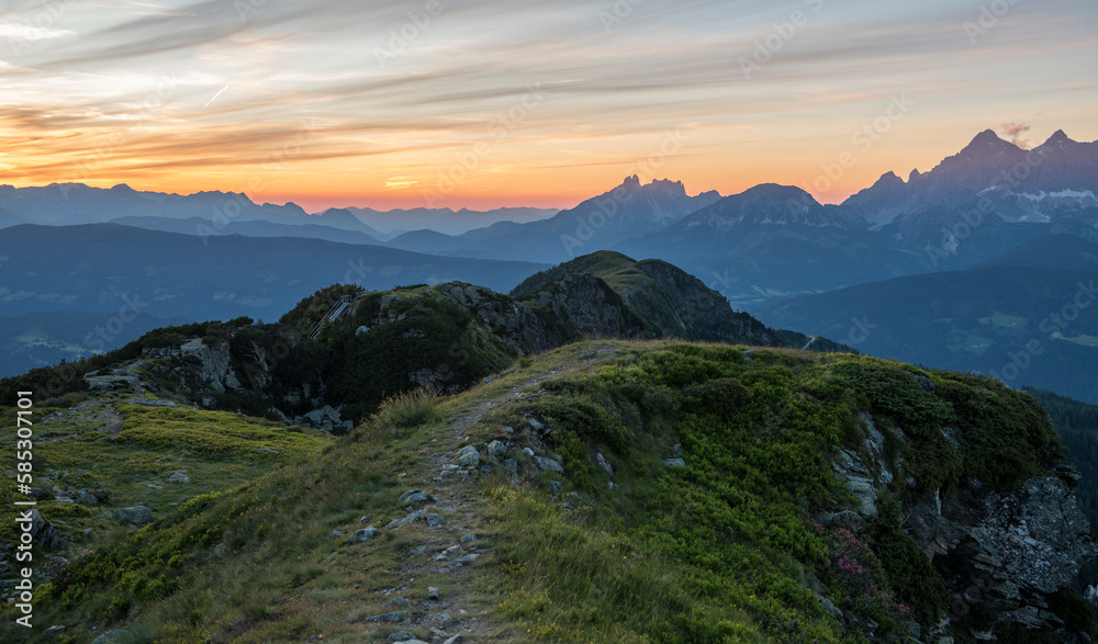Sunset view from Rippeteck mountain, 2126 m, near Schladming, Salzburg. Austria. Sunset above mountains. Austrian alps.