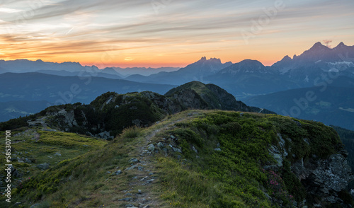 Sunset view from Rippeteck mountain  2126 m  near Schladming  Salzburg. Austria. Sunset above mountains. Austrian alps.