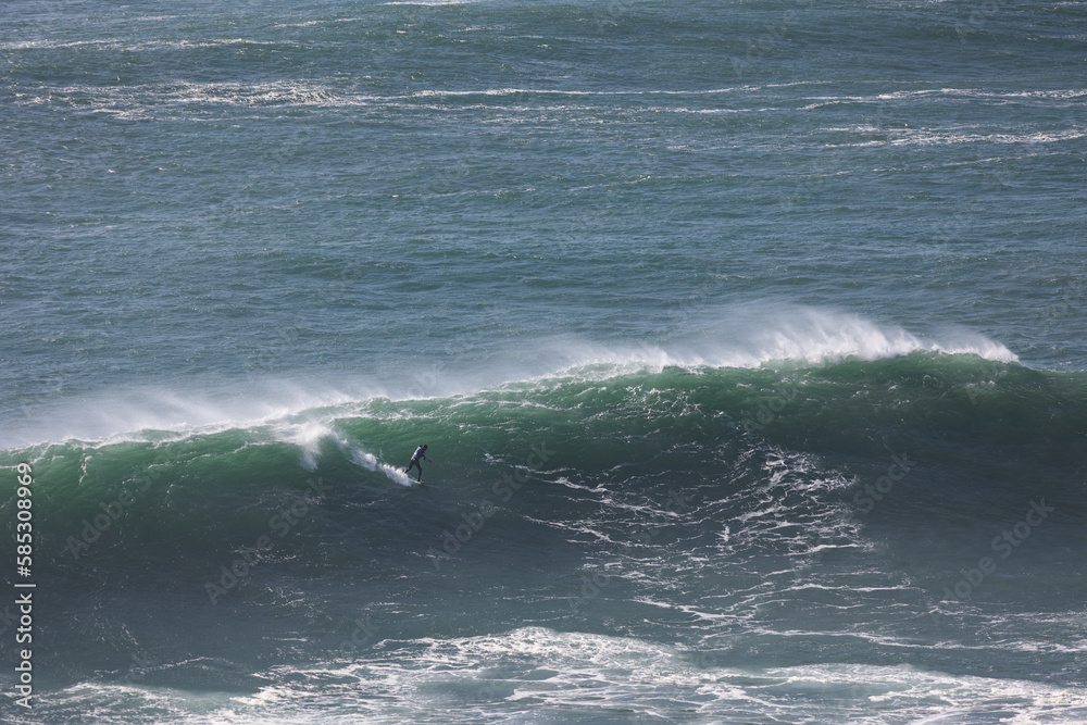 A surfer ride on sea wave A surfer ride on sea wave