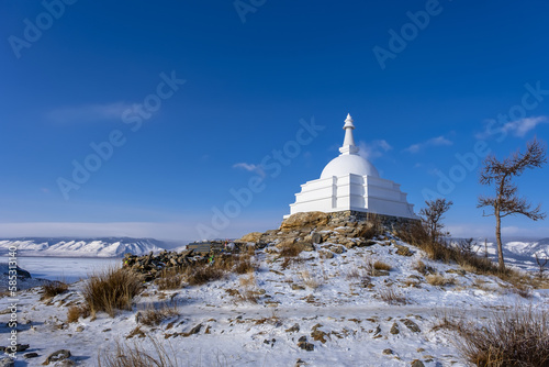 Sacred stupa on Ogoy island, Baikal in February, Russia