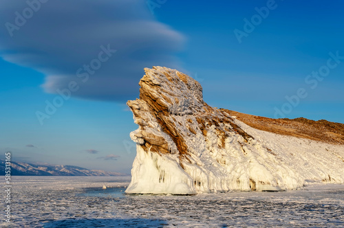 Baikal. Small Sea. The southern rocky tip of Ogoy (Ugungoy) Island in the evening illumination photo