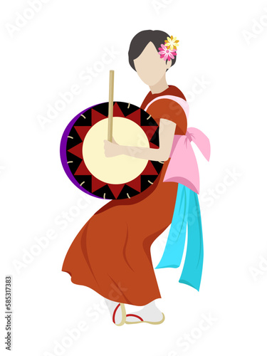 太鼓を持って岩手のさんさ踊りをする女性