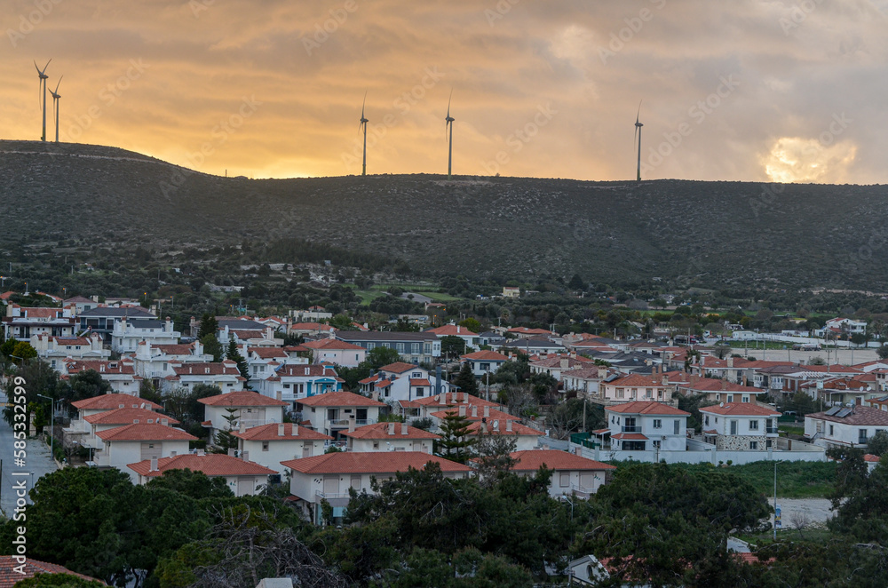 scenic view of Alacati town and windmills on local hills (Cesme, Izmir region, Turkey)