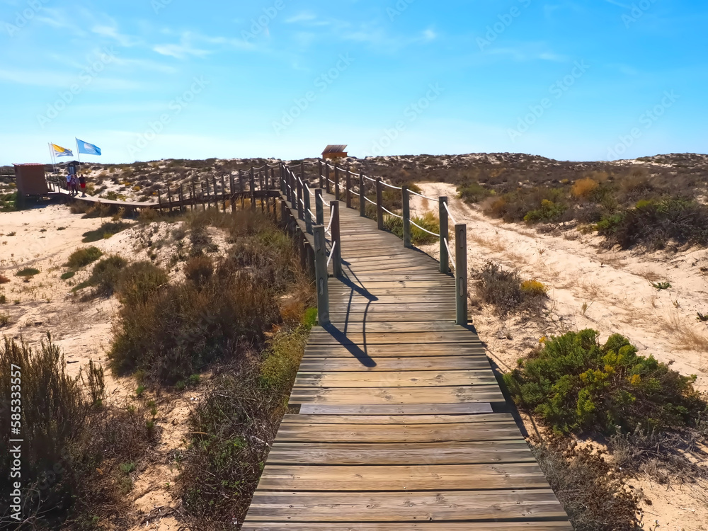 Hiking across the beautiful island of Culatra at the Algarve coast of Portugal