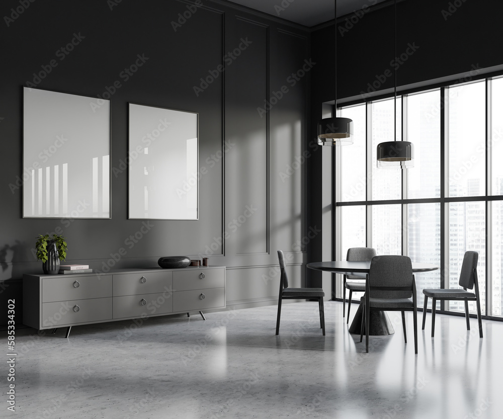 Fototapeta premium Gray dining room with dresser and posters