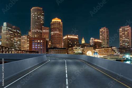 Empty urban asphalt road exterior with city buildings background. New modern highway concrete construction. Concept of way to success. Transportation logistic industry fast delivery. Boston. USA. © VideoFlow
