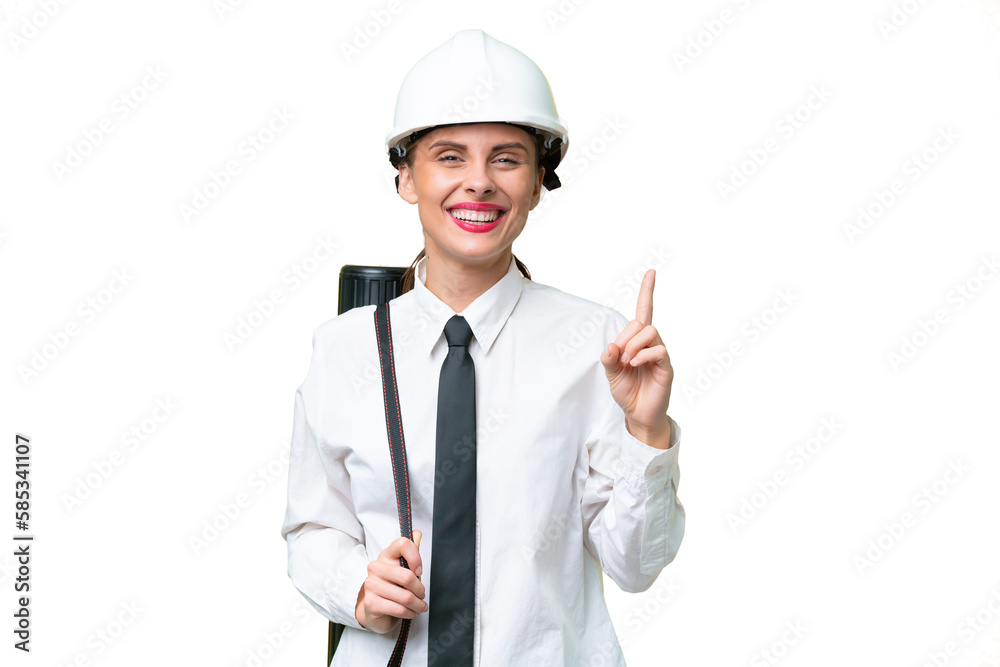 Young architect woman with helmet and holding blueprints over isolated background pointing up a great idea