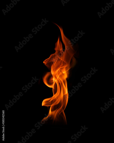 Include burning flame fire isolated on dark background for graphic design purposes. 