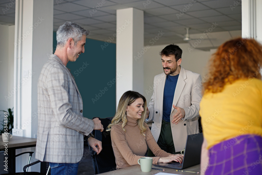Happy team of environmentalists having a meeting at casual office. Happy team of environmentalists having a meeting at casual office.