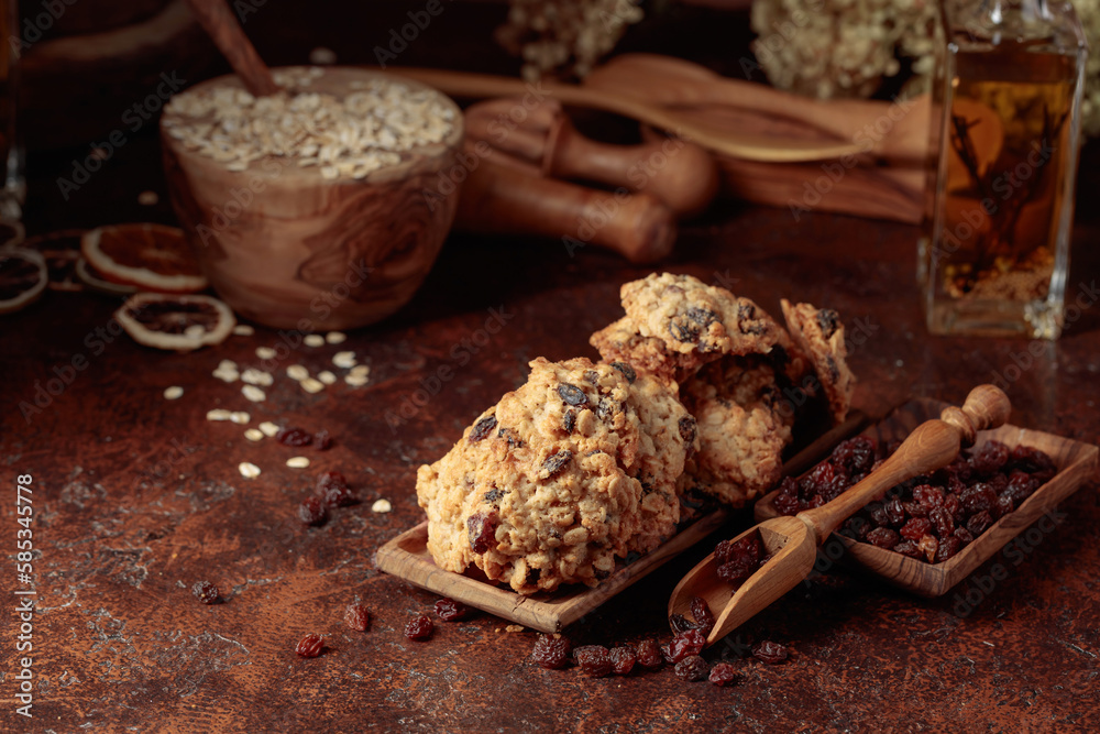 Fototapeta premium Oatmeal raisin cookies on a brown table.