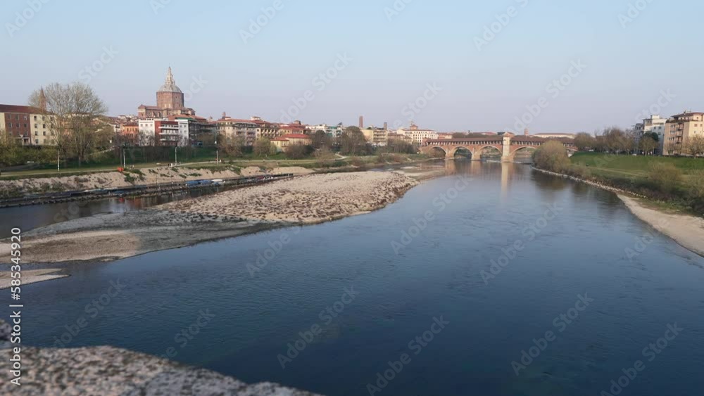 Ponte Coperto (covered bridge) and Duomo di Pavia (Pavia Cathedral) in Pavia at sunny day, Lombardy, italy,60 fps. Ponte Coperto (covered bridge) and Duomo di Pavia (Pavia Cathedral) in Pavia at sunny day, Lombardy, italy,60 fps.