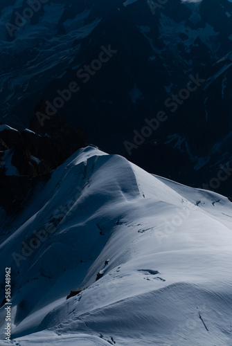 View on mountain with snow in Alps in sunny day