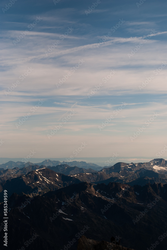 Mountain range in snow in Alps in sunny day