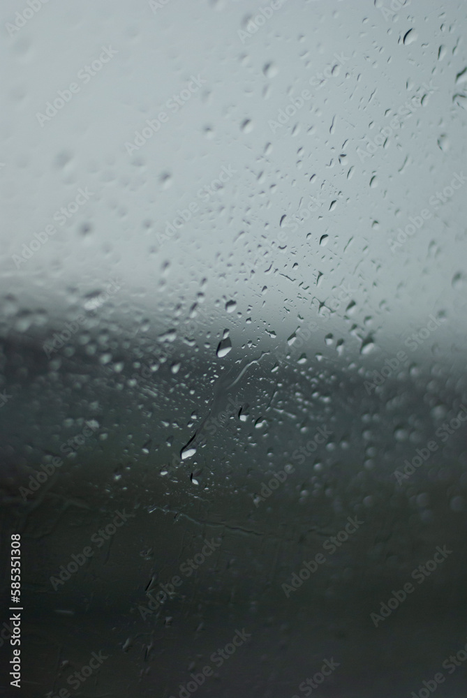 View on raindrops on car window