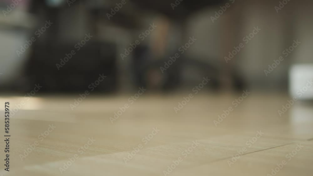 Automatic robot vacuum cleaner cleans the tile floor with the sweeper and mops with a modern sensor. Automatic robot vacuum cleaner cleans the tile floor with the sweeper and mops with a modern sensor.