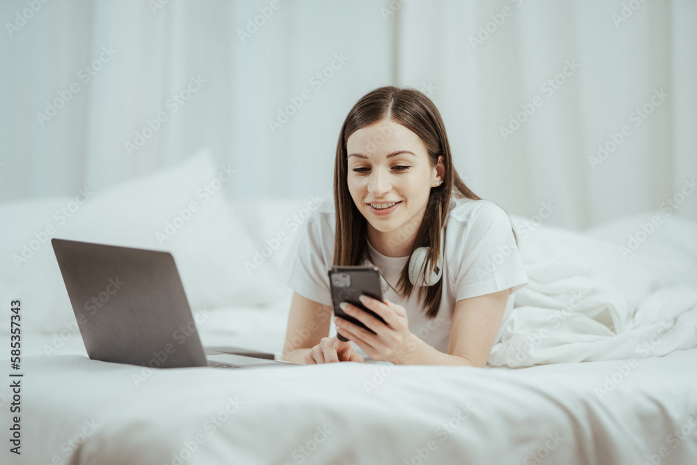 beautiful girl talking on the phone in bed Beautiful young woman doing herself on bed at home beautiful girl talking on the phone in bed Beautiful young woman doing herself on bed at home