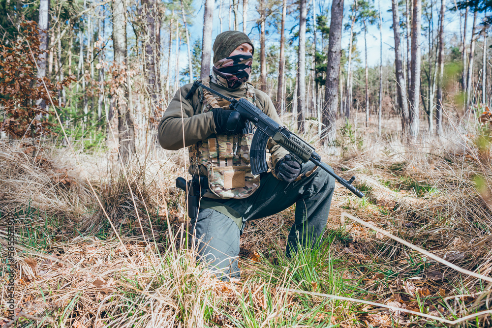Soldier in a trench. Member of the International Legion patrols. The war in Ukraine.Army soldier Patrolled the front line Soldier in a trench. Member of the International Legion patrols. The war in Ukraine.Army soldier Patrolled the front line
