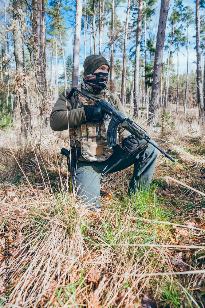 Soldier in a trench. Member of the International Legion patrols. The war in Ukraine.Army soldier Patrolled the front line Soldier in a trench. Member of the International Legion patrols. The war in Ukraine.Army soldier Patrolled the front line