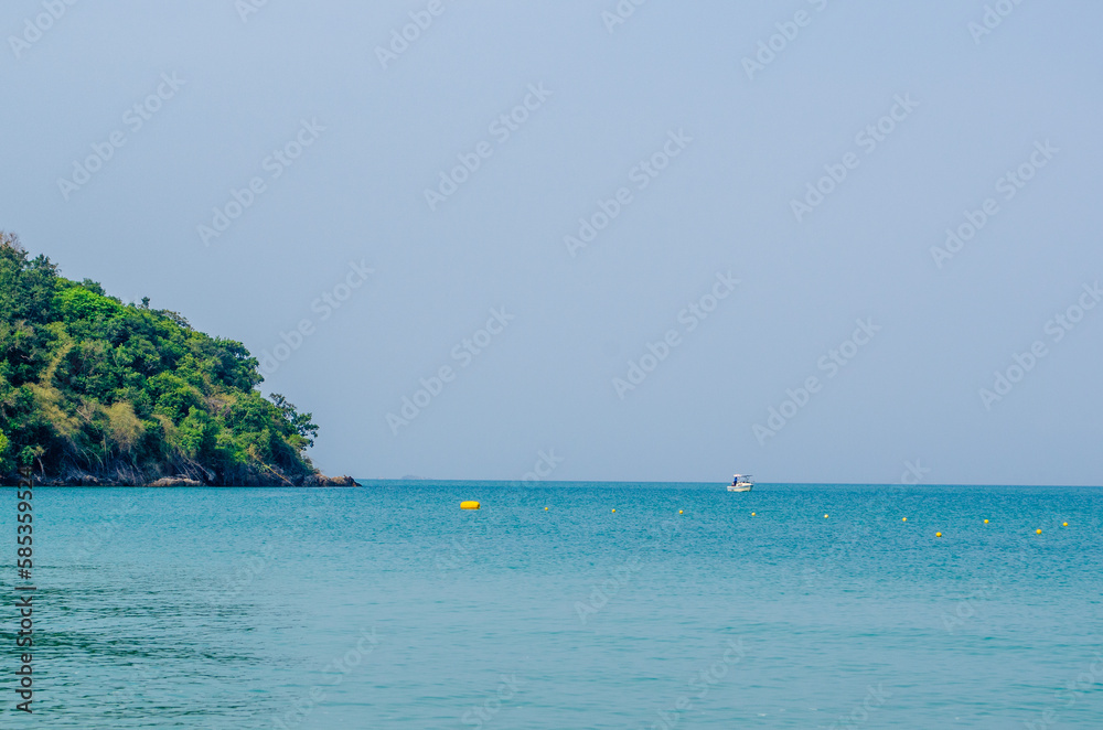 Views of the natural landscape, the beautiful tropical beach and the sea on a sunny day. Beach sea space