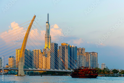 Beautiful sunset at 81 Ho Chi Minh Landmarks, the tallest building in Vietnam and the Cau Ba Son Bridge