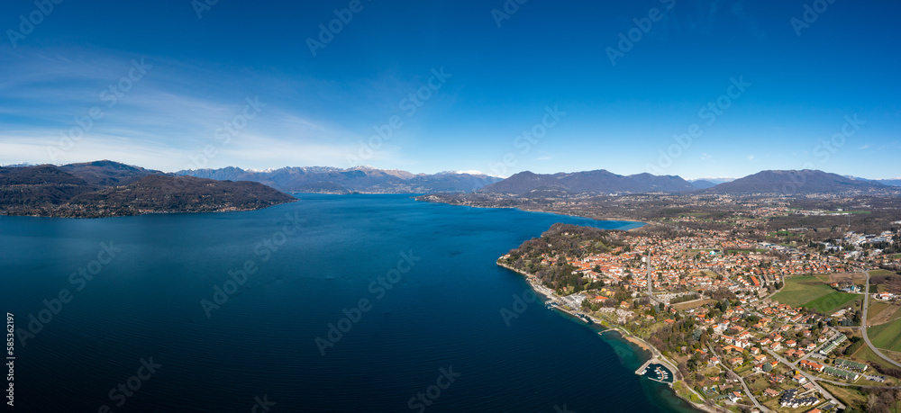 landscape panorama of Lake Maggiore in the Italian Lake District and the village of Ispra