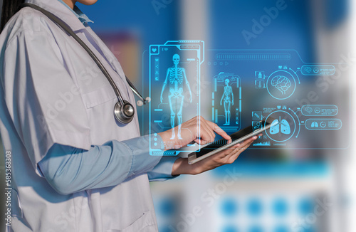 Doctor using clipboard and digital tablet find information patient medical history at the hospital. Medical technology concept. © NINENII