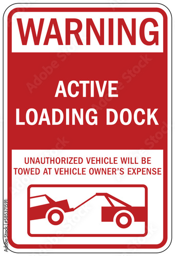 Loading dock sign and labels active loading dock. Unauthorized vehicle will be towed at vehicle owners expense