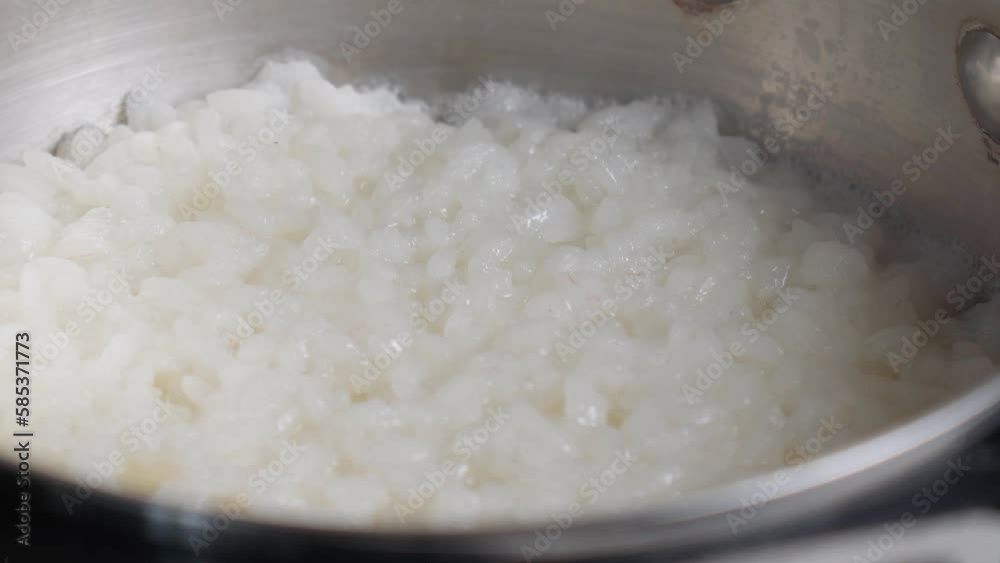 Boiled rice close-up. Cooked white rice. Rice background. Selective focus Boiled rice close-up. Cooked white rice. Rice background. Selective focus