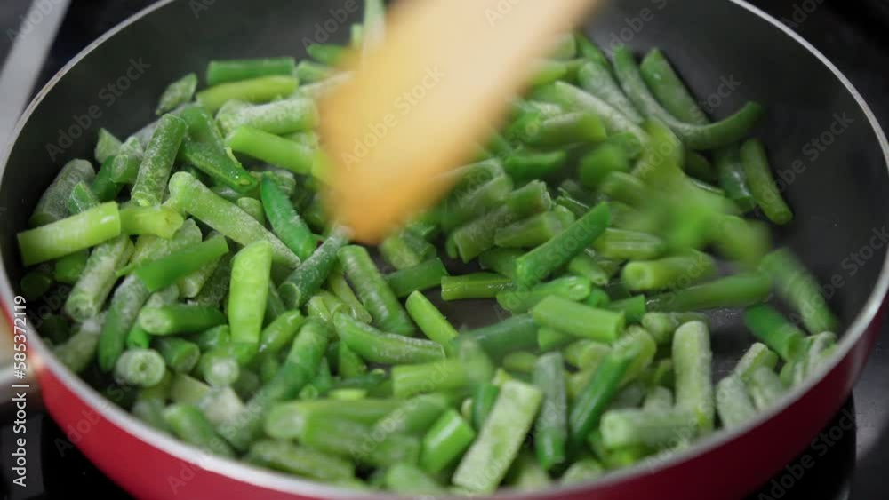 Preparation of frozen green beans. Cooking concept, cookbook, recipes Preparation of frozen green beans. Cooking concept, cookbook, recipes