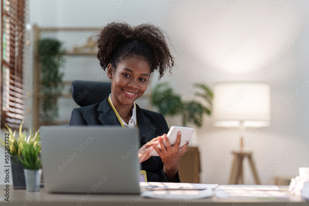Accountant black woman working on laptop and do document, tax, exchange, accounting and Financial advisor concept Accountant black woman working on laptop and do document, tax, exchange, accounting and Financial advisor concept