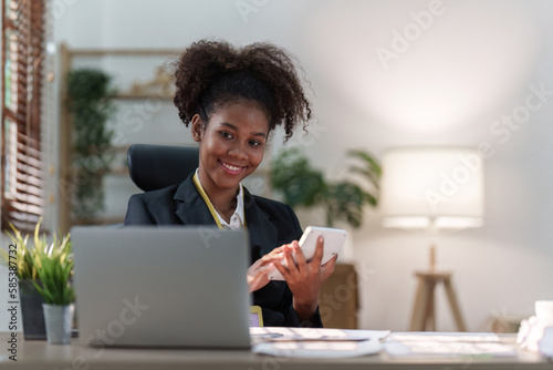 Accountant black woman working on laptop and do document, tax, exchange, accounting and Financial advisor concept