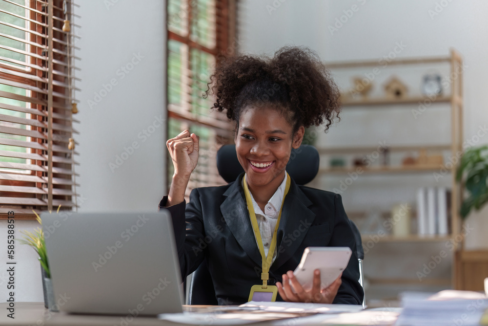 Tired American African business woman in stress works with many paperwork document. migraine attack. Freelance, work from home Tired American African business woman in stress works with many paperwork document. migraine attack. Freelance, work from home