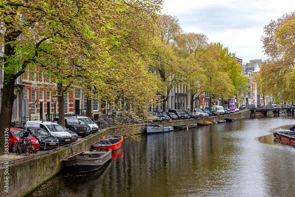 Dutch houses and canals on the street of Amsterdam