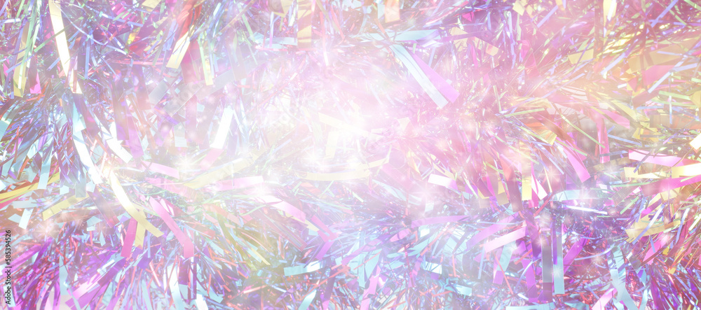 Fototapeta premium Party tinsel messy random fun background - multicoloured shiny glittering tinsel ideal for a new year party invitation template 
