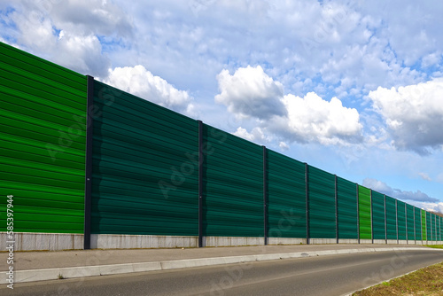 Acoustic noise protection wall, also called noise fence barrier or road sound barrier for the protection from highway noise