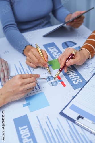 small business accounting team meeting three asian people with salary monthly charts data, basic business accounting and bookkeeping concept.