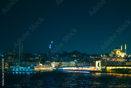 Istanbul view with Galata Bridge and Suleymaniye Mosque and crescent moon