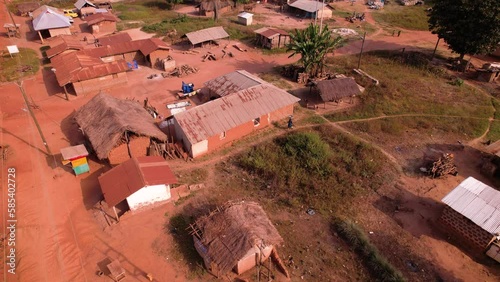 Drone shots and aerial view of dusty roads and dilapidated buildings in rural Africa. photo