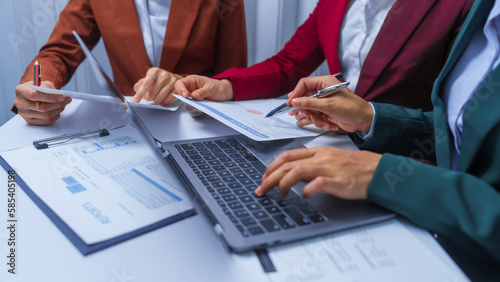small business accounting team meeting three asian people with salary monthly charts data, basic business accounting and bookkeeping concept.
