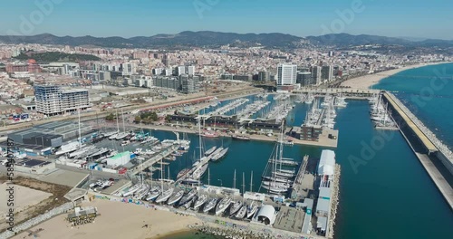 Badalona , Spain - February 22, 2023: The port of Marina de Badalona is a marina and fishing port located in the city of Badalona, province of Barcelona, Spain. Catalonia. photo