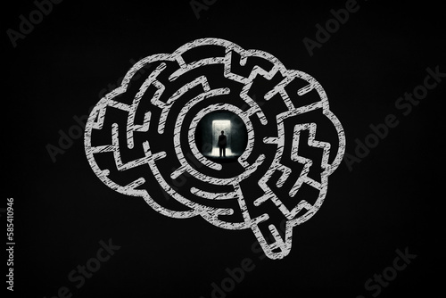 Big Idea Concept. The man open the door in the maze shaped brain.