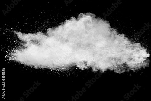White talcume powder explosion on black background. White dust particles splash.