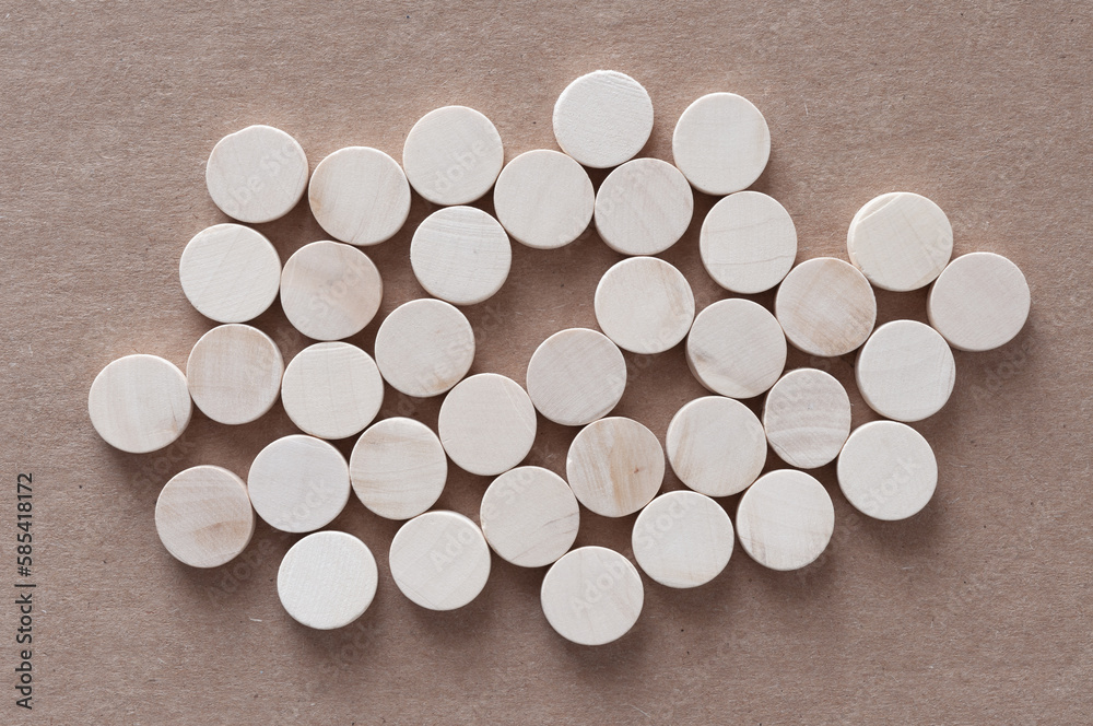 random shape composed of many small wooden circles random shape composed of many small wooden circles