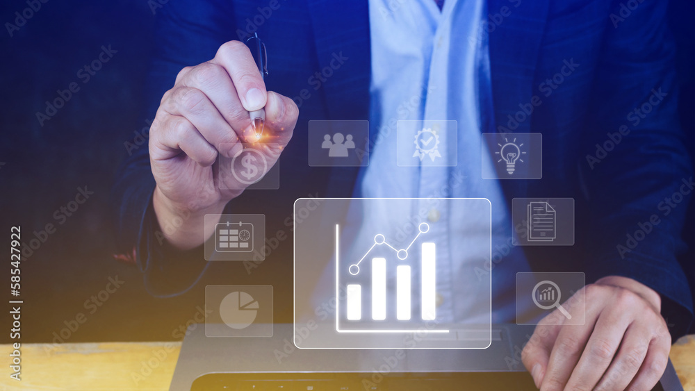 Fototapeta premium Big data analytics and business intelligence BI concept with chart and graph icons on digital screen interface and business people in the background.